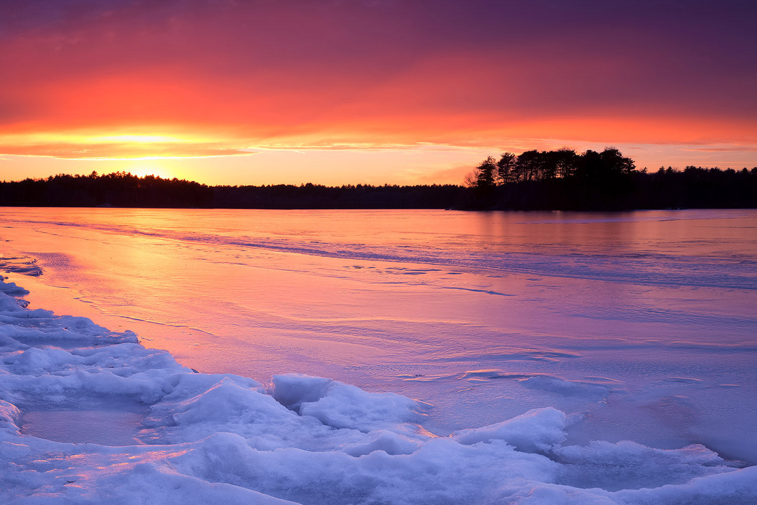 Sunset over frozen Spot Pond - Middlesex Fells, Massachusetts